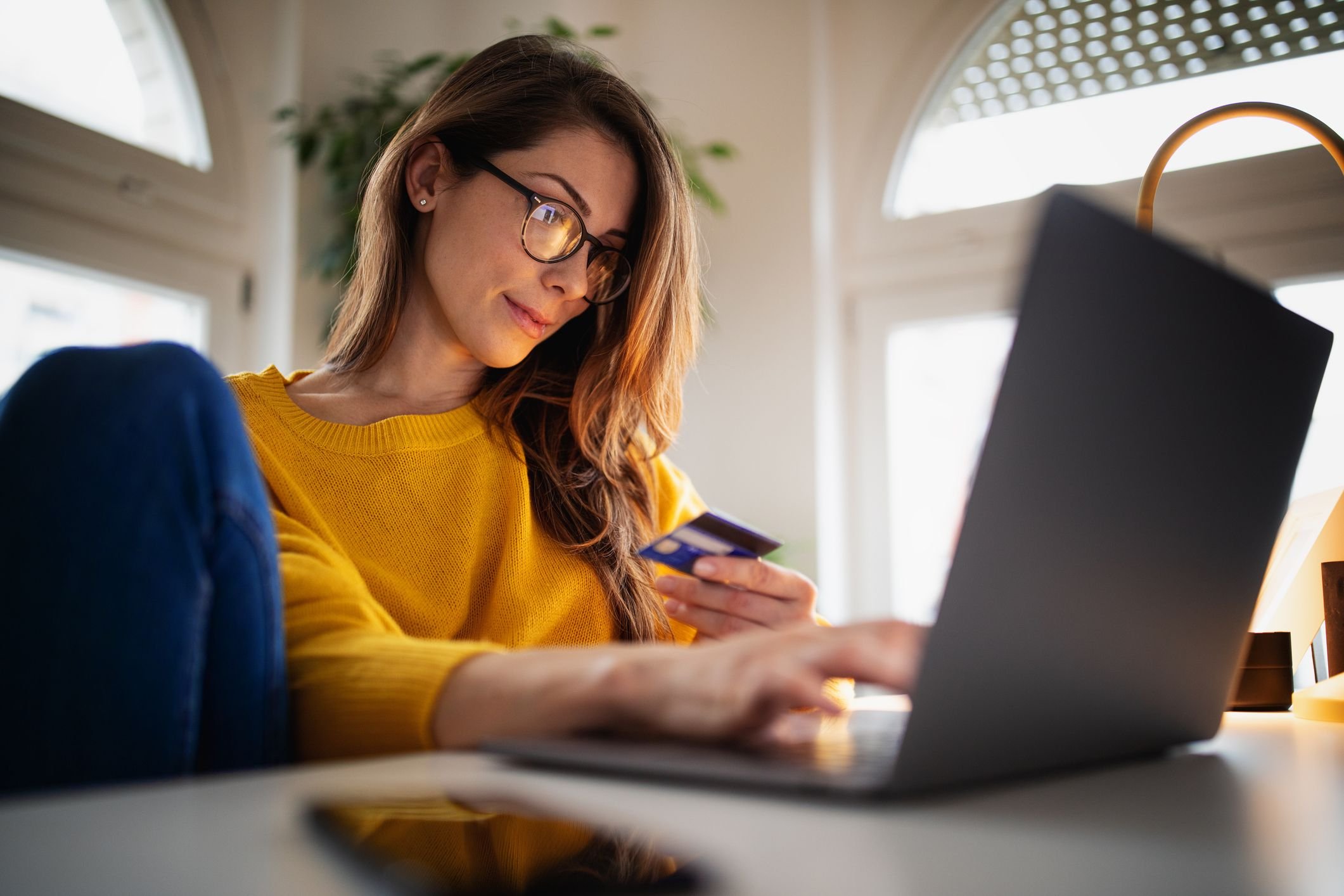 A person using a laptop, representing the e-commerce industry